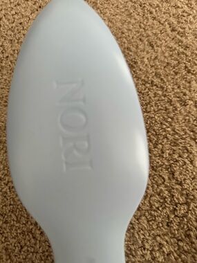 NORI Embossed Light Blue Travel iron